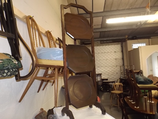 A Three Tier Mahogany Cake Stand