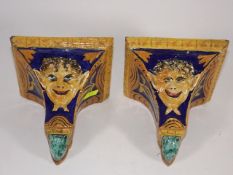 A Pair Of Continental Faience Style Wall Shelves