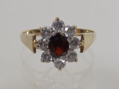 A Ladies 9ct Ring With Garnet