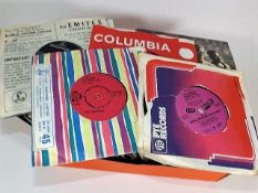 A Box Of Singles Including Beatles, The Sex Pistol