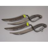 A Pair Of Islamic Style Daggers In White Metal She