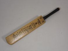 A 1953 Australia Miniature Cricket Bat Bearing Fac