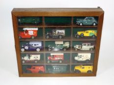 A Cased Box Of Diecast Cars & One Other Case