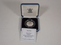 A Silver Proof Piedfort Fifty Pence Coin