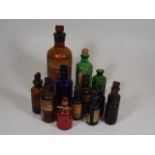A Collection Of Antique Poison & Medicine Bottles