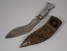 An Asian White Metal Dagger In Decorative Sheaf
