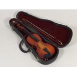 A Small Cased Childs Violin