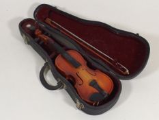A Small Cased Childs Violin