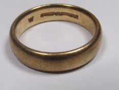 A Large 9ct Gold Band