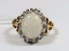 An 18ct Gold Opal & Diamond Ring