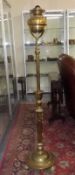 A Heavy Floor Standing Brass Victorian Oil Lamp