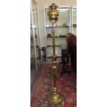 A Heavy Floor Standing Brass Victorian Oil Lamp