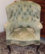 A Victorian Barrel Back Upholstered Armchair