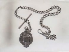 A Silver Albert Chain With Silver Fob