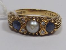 An 18ct Gold Ring With Sapphire, Diamond & Simulat