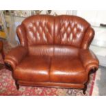 A Small Two Seater Leather Sofa With Burr Walnut D