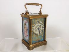 A French Brass Carriage Clock With Porcelain Plaqu