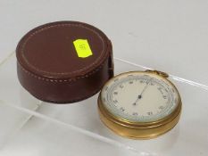 An Air Ministries Brass Pocket Aneroid Barometer