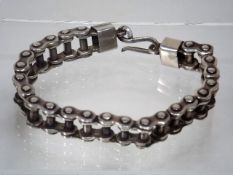 A .925 Marked Silver Bracelet Resembling A Bike Ch