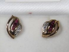 A 9ct Gold Pair Of Modern Diamond & Ruby Ear Rings