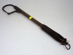 An Antique Brass Fishing Gaff With Wood Handle