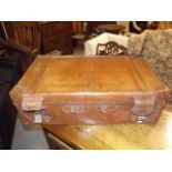 An Antique Large Leather Travel Trunk