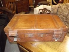 An Antique Large Leather Travel Trunk