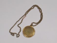 A 9ct Gold Chain With Locket