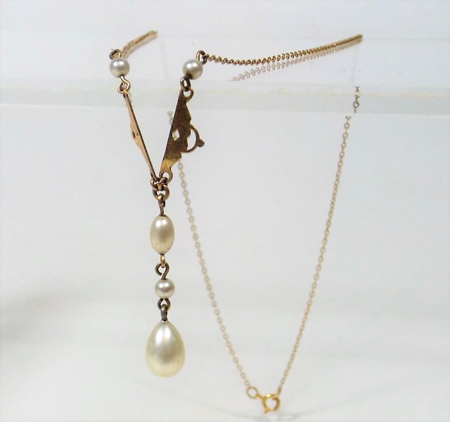 A 9ct Gold Necklace With Simulated Pearl