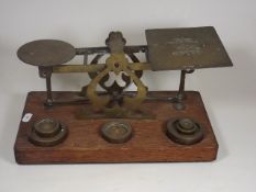 A Large Set Of Post Office Scales On An Oak Plinth