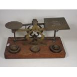 A Large Set Of Post Office Scales On An Oak Plinth