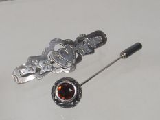 A Silver Tiepin With Garnet Stone Twinned With Sil