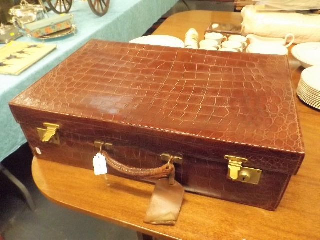 An Army & Navy Leather Suitcase