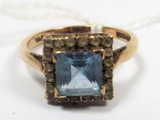 A 9ct Gold Ring With White & Blue Stones