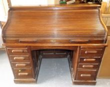 An Early 20thC. Oak Roll Top Desk