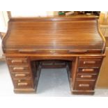 An Early 20thC. Oak Roll Top Desk