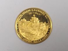 A 22ct Gold Proof Coin Commemorating The Moon Land