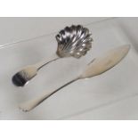 A Shell Shaped Silver Caddy Spoon Twinned With Sil