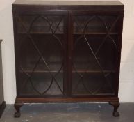 A Glazed Mahogany Display Cabinet With Ball & Claw