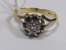 A 9ct Gold Diamond & Sapphire Ring, Lacking One St