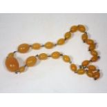 A 19thC. Set Of Yellow Natural Amber Beads Weight