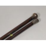 A Silver Topped Rosewood Walking Cane