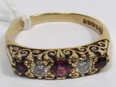 An 18ct Gold Diamond & Ruby Carved Half Hoop Ring