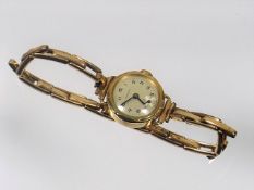 A Ladies Harcyl 9ct Gold Watch & Rolled Gold Strap