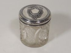 An Antique Cut Glass Powder Jar With Embossed Silv