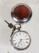A Gents Silver Key Wind Pocket Watch With Protecti
