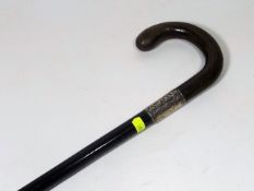 An Antique Walking Cane With Silver Collar & Rhino