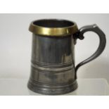 A Brass Rimmed Quart Pewter Tankard