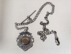 A Silver Albert Chain With Silver & Gold Fob
