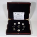 A Boxed Silver & Gold Plated Presentation Set Of B